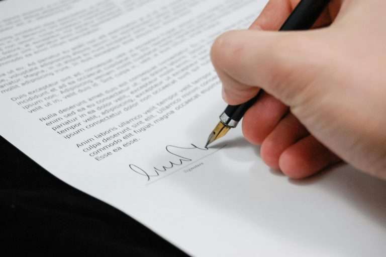 A person signing a document to represent a contract being signed. For the RTS Academy Finance Legislation course