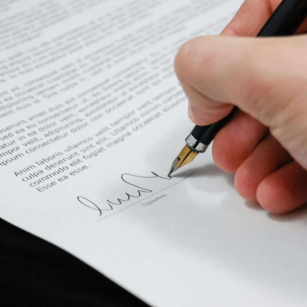 A person signing a document to represent a contract being signed. For the RTS Academy Finance Legislation course