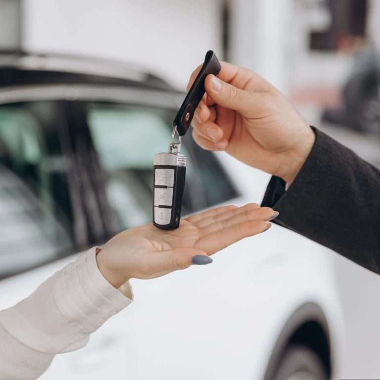 An exchange of car key in the automotive handover process. For RTS Academy.