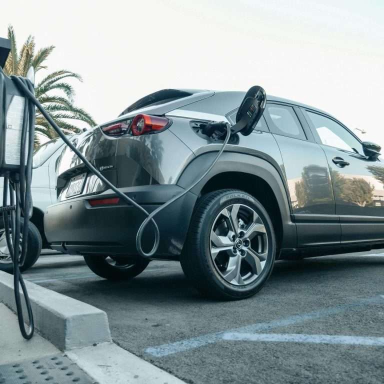 An electric vehicle plugged in and charging. For the leadership for EV course on RTS Academy.